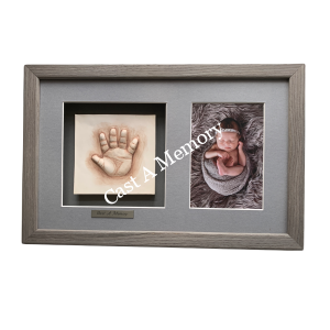 baby clay hand impression with photograph in wooden frame